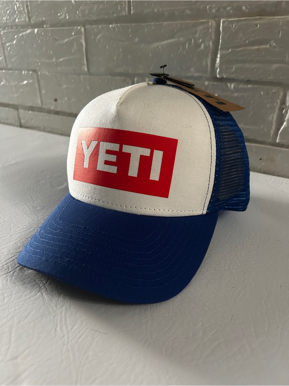 American Yeti White and Blue Trucker Hat with Red Logo Patch NWT